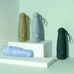 새로운 안티 UV 확대 이중 목적 태양 우산 작은 우산 UV 선 스크린 검은 고무 파라솔 파라그 미니 캡슐 우산
