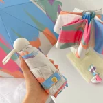 미니 UV 우산 작은 태양 주머니 여행 비 우산 비닐 접는 우산 UV 보호 태양 그늘 주머니 파라솔 캡슐 우산 - 이미지 2