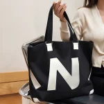 바닥이 단단한 지퍼 가방 캔버스 숄더백 면 에코백 기저귀가방 여성 학생 호보백 보부상가방 - 이미지 4